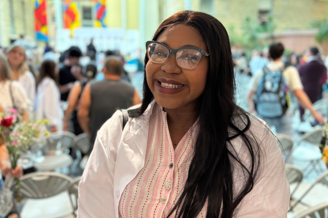 Portrait of Dr. Chidinma Ikeogu wearing a white coat. 