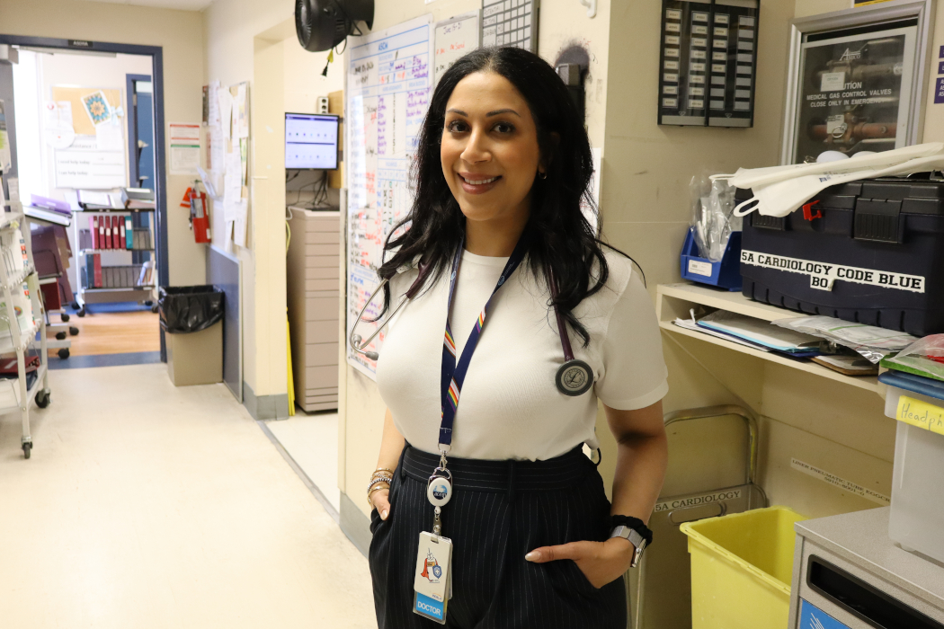 Portrait of Dr. Mahwash Saeed in a hospital hallway.