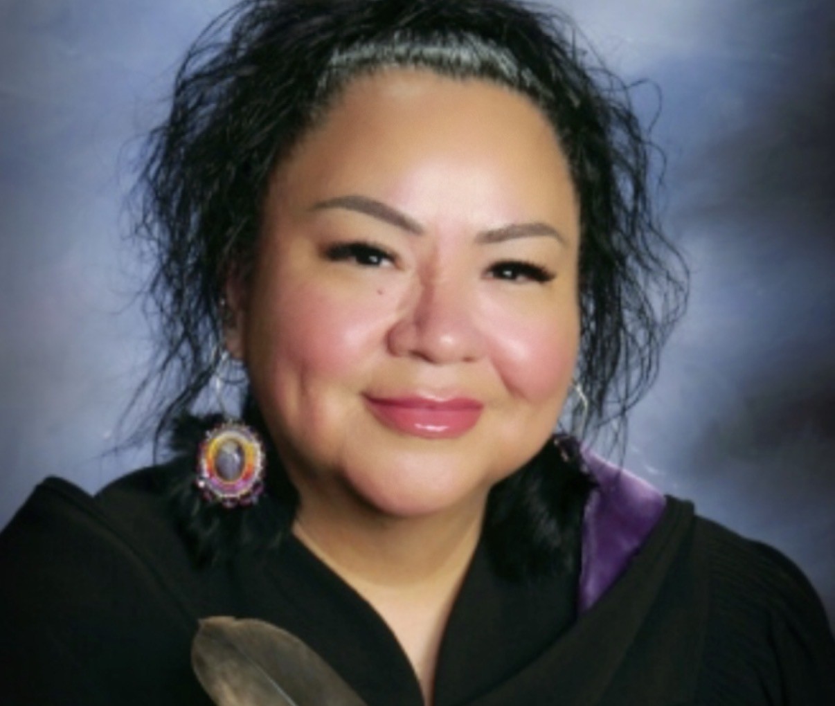 Glennis Bird celebrates her graduation.