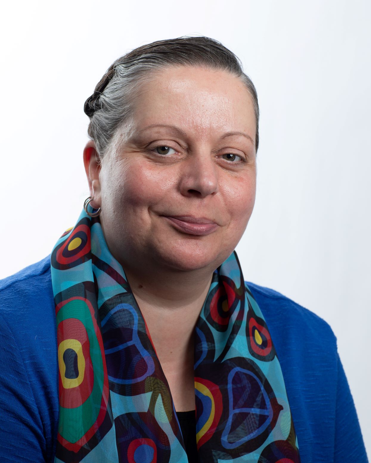 Smiling woman with scarf