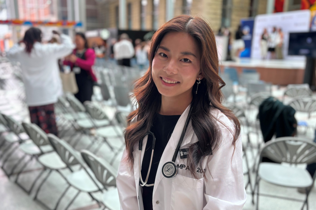 Portrait of Maki Matsuura wearing a white coat and a stethoscope around her neck.