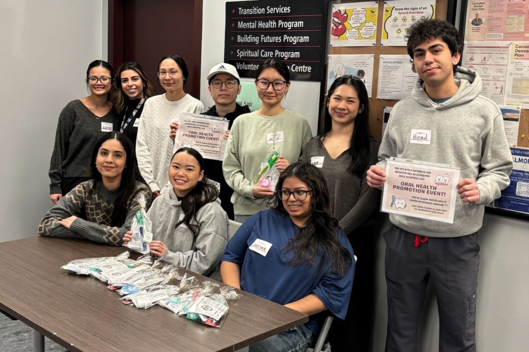 10 dental students pose for a photo. 