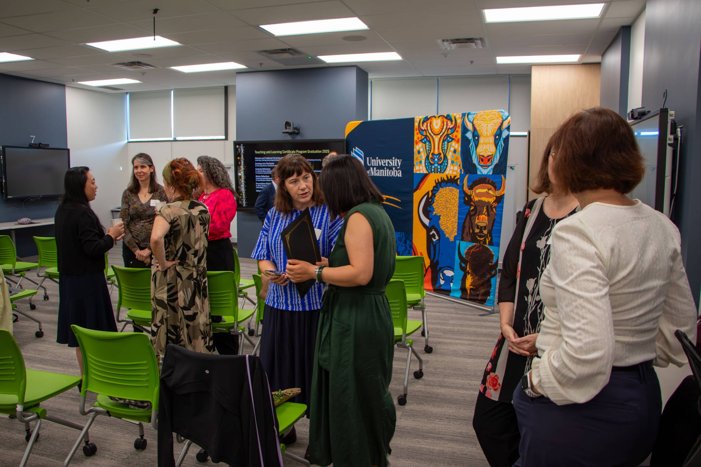 crowd mingling at TLC graduation 2025