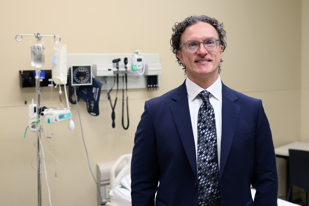 Portrait of Dr. Ryan Zarychanski in a clinical setting. 