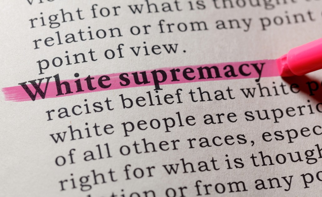 The words 'white supremacy' highlighted on a page.