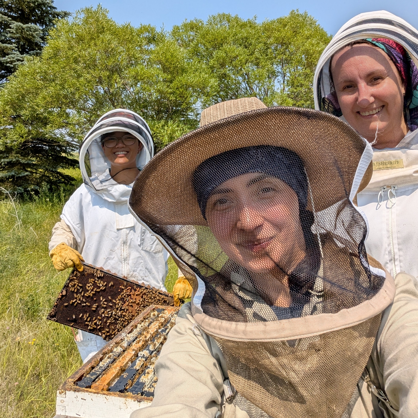 Nuria Morfin in bee keeper clothing