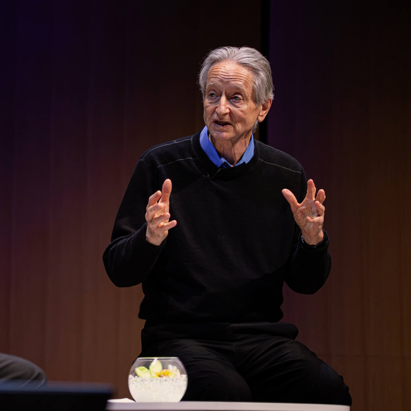 A man speaking on stage