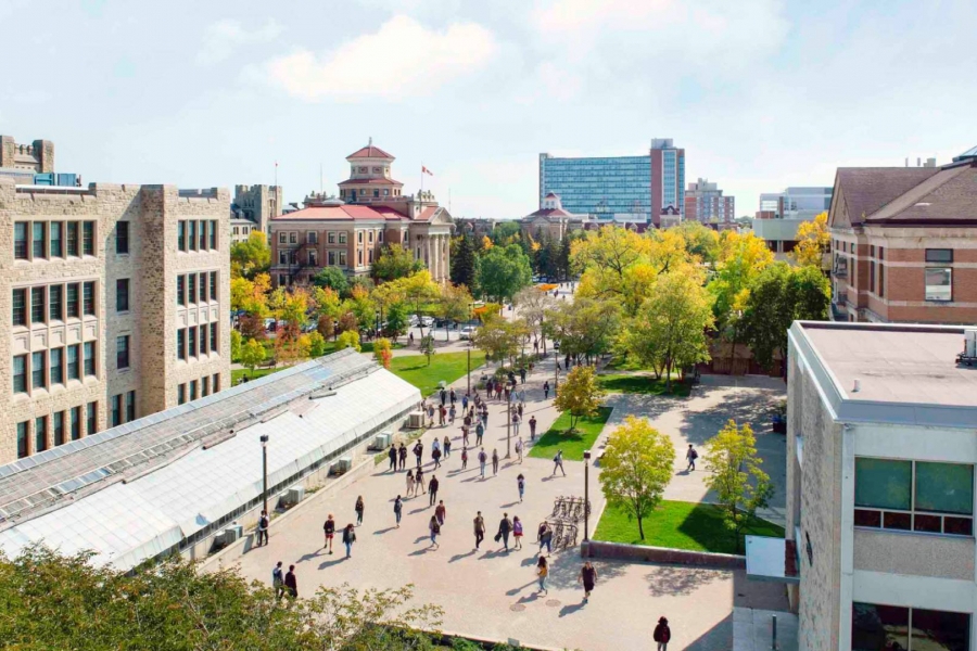 An aerial view of the Fort Garry campus featuring the Allen Building, the Administration Building and Pembina Hall in the distance.