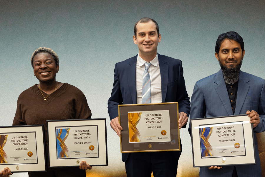 Award winners holding their certificates
