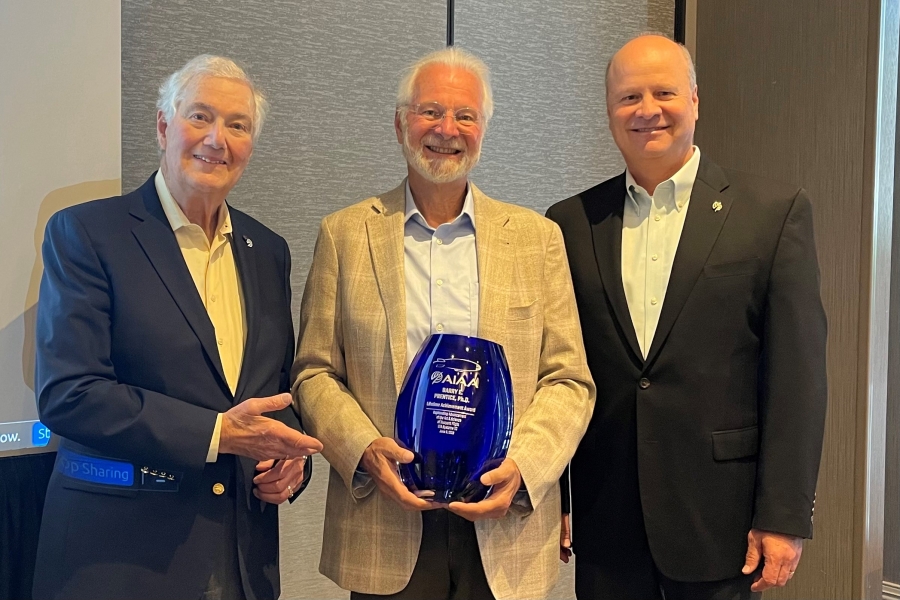 Barry prentice receives an award