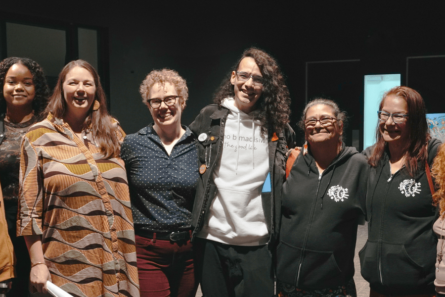 Researchers Mayor and Chamerlain pose with report collaborators
