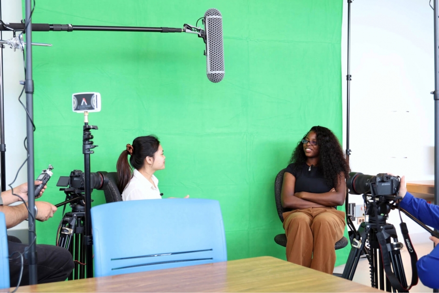 Students and staff film a video in the new Digital Literacies Lab in the Faculty of Education.
