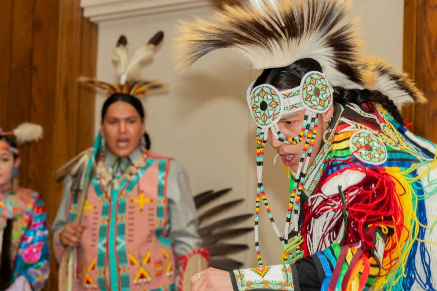 An Indigenous dancer in regalia