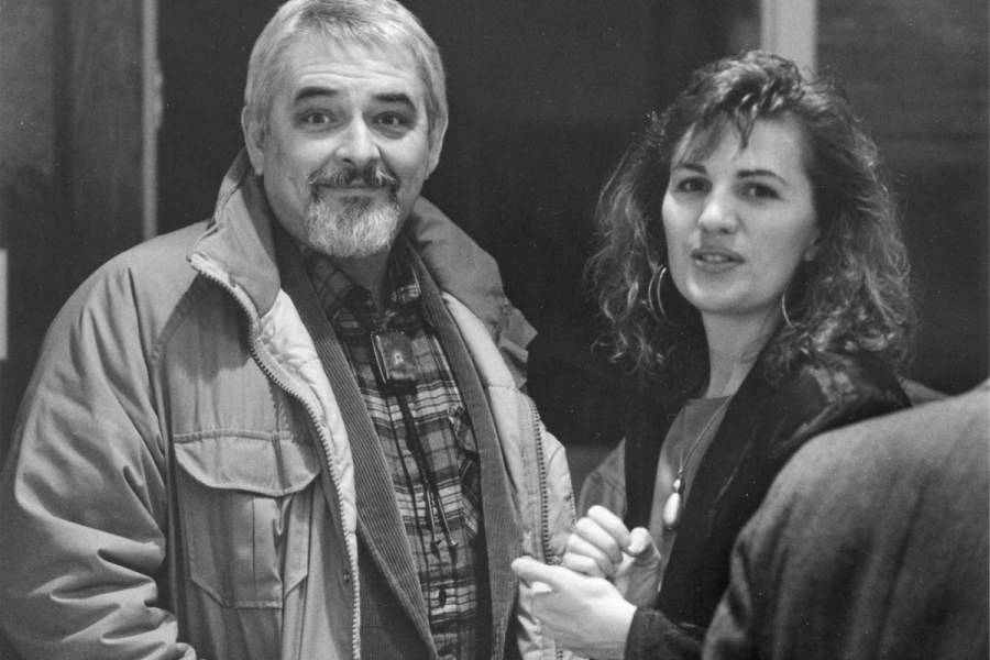 Grace Nickel and Bob Archambeau stand together at her 1987 solo exhibition, looking toward the camera.