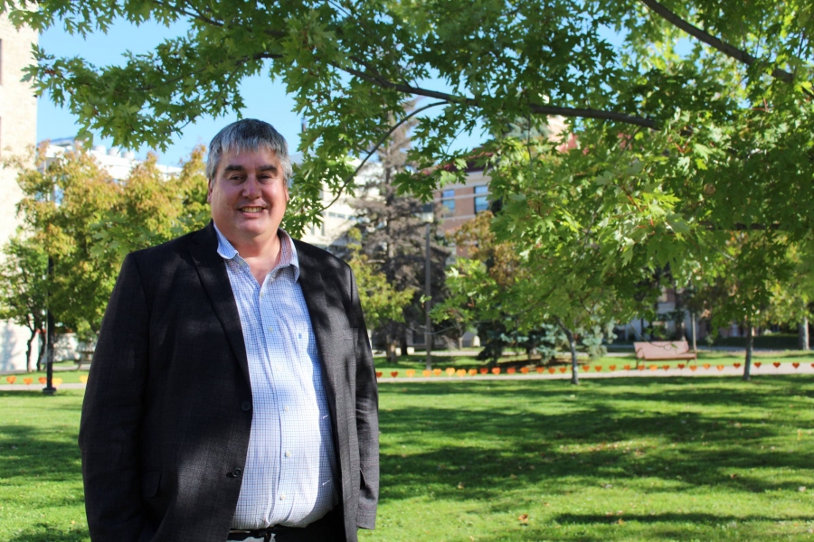 Dr. Todd Duhamel standing outside on the UM Fort Garry campus.