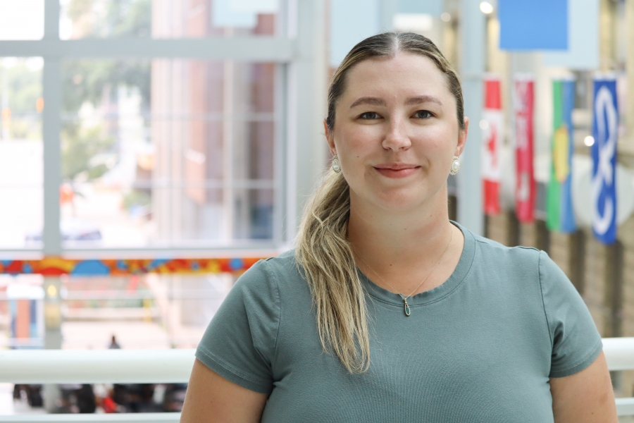 Maeghan Johnson standing in the atrium at Bannatyne campus.