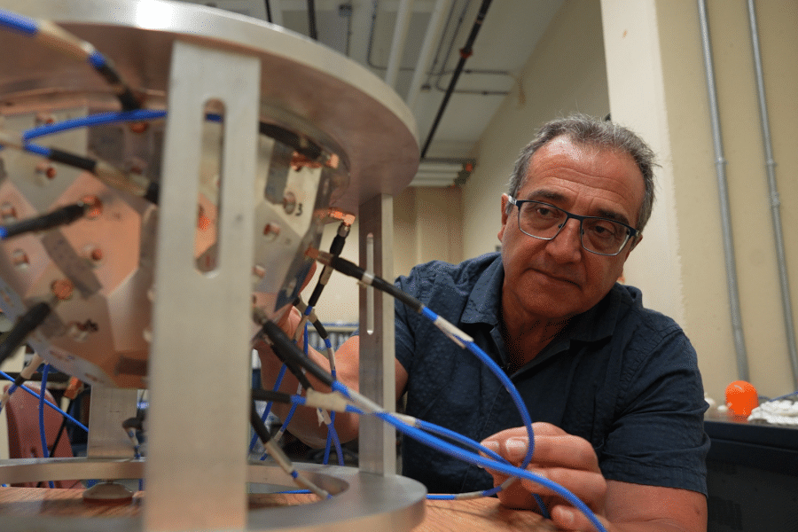 A man beside equipment
