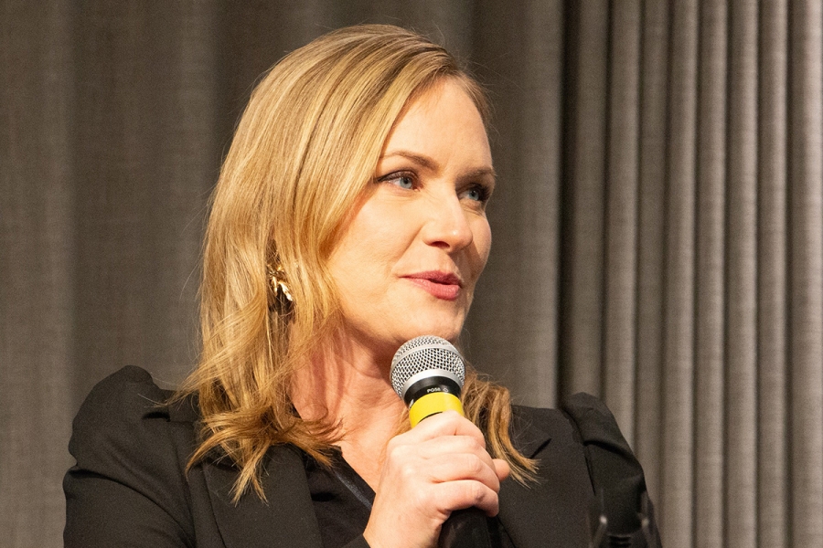 Dr. Mandy Archibald speaks at a conference.