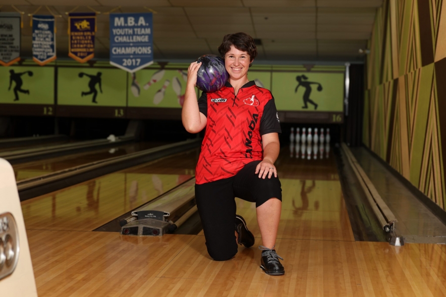 Marissa Naylor poses with a bowling ball