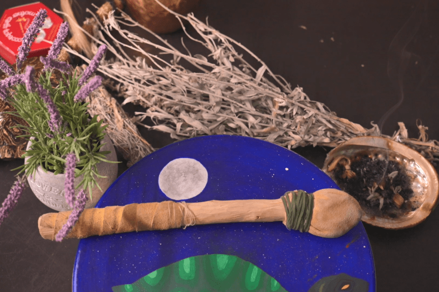 bundle of traditional medicines, painted hand drum and rattle