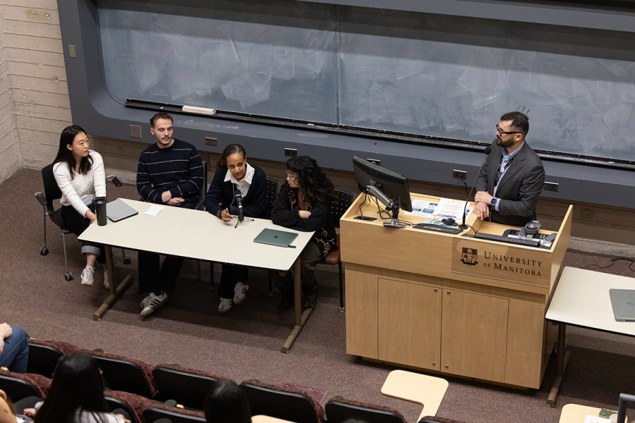 JungEun Kim, Taulant Tahiri, Wintana Mokonnen and Danielle Borbajo in a panel discussion with moderator Dr. Mayson Sousa.