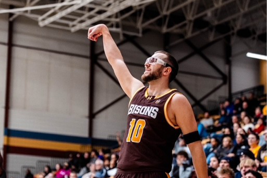 Sam Jensen waving goodbye to the ball after a shot