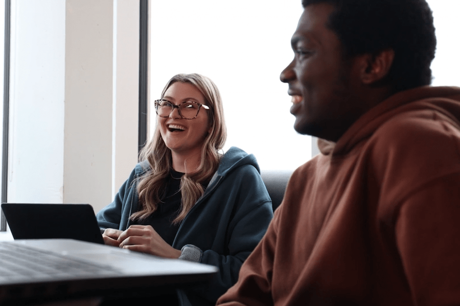 Two students sitting at a table