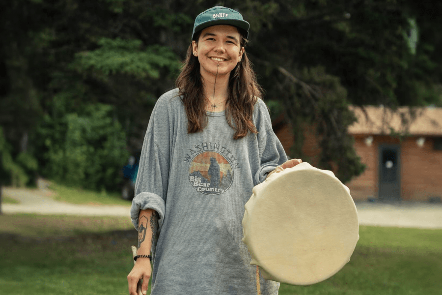 Sunday Queskekapow holding drum