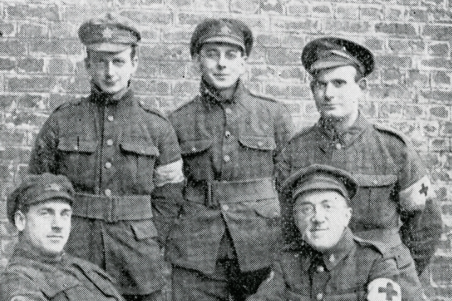 Archive photo from World War one showing five men wearing army uniforms.