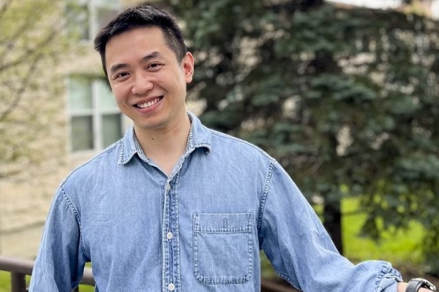 Xinyang standing in front of the St John's residence
