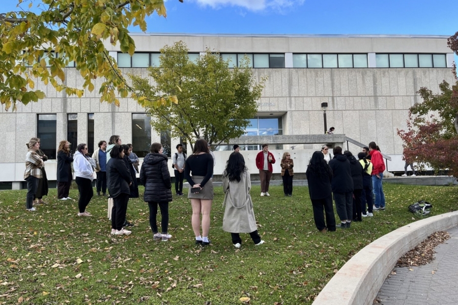group of Indigenous students stand outside Faculty of Education building