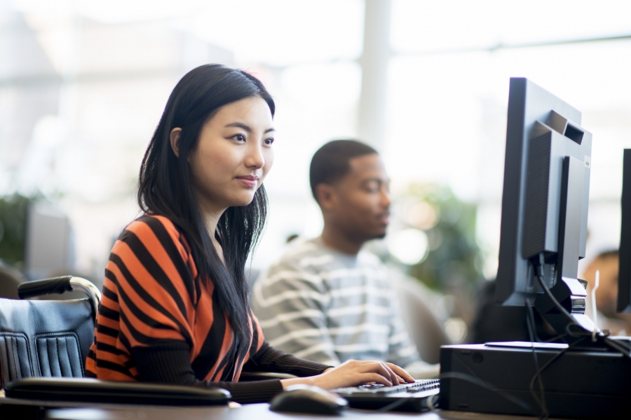 Student at desktop computer in lab