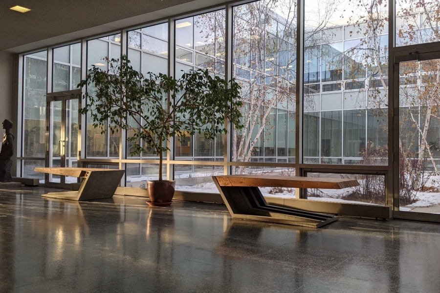 Two cantilevered benches in the foyer of the John A. Russel building. 