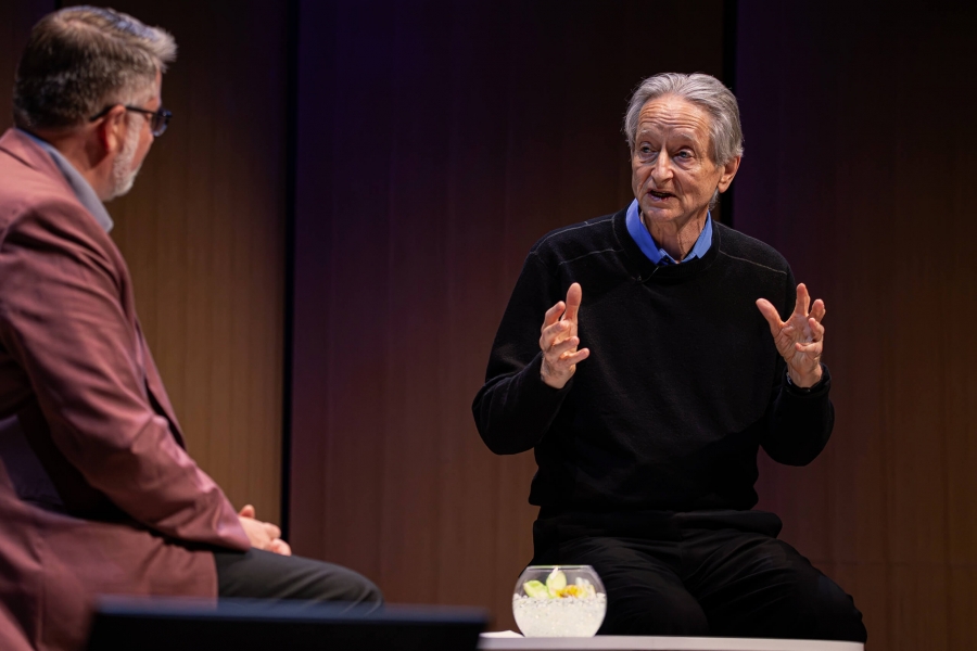 A man speaking on stage