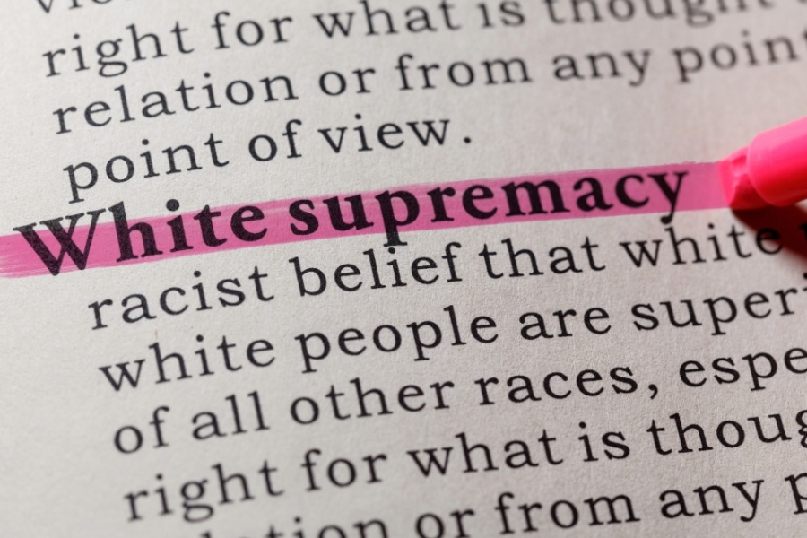 The words 'white supremacy' highlighted on a page.