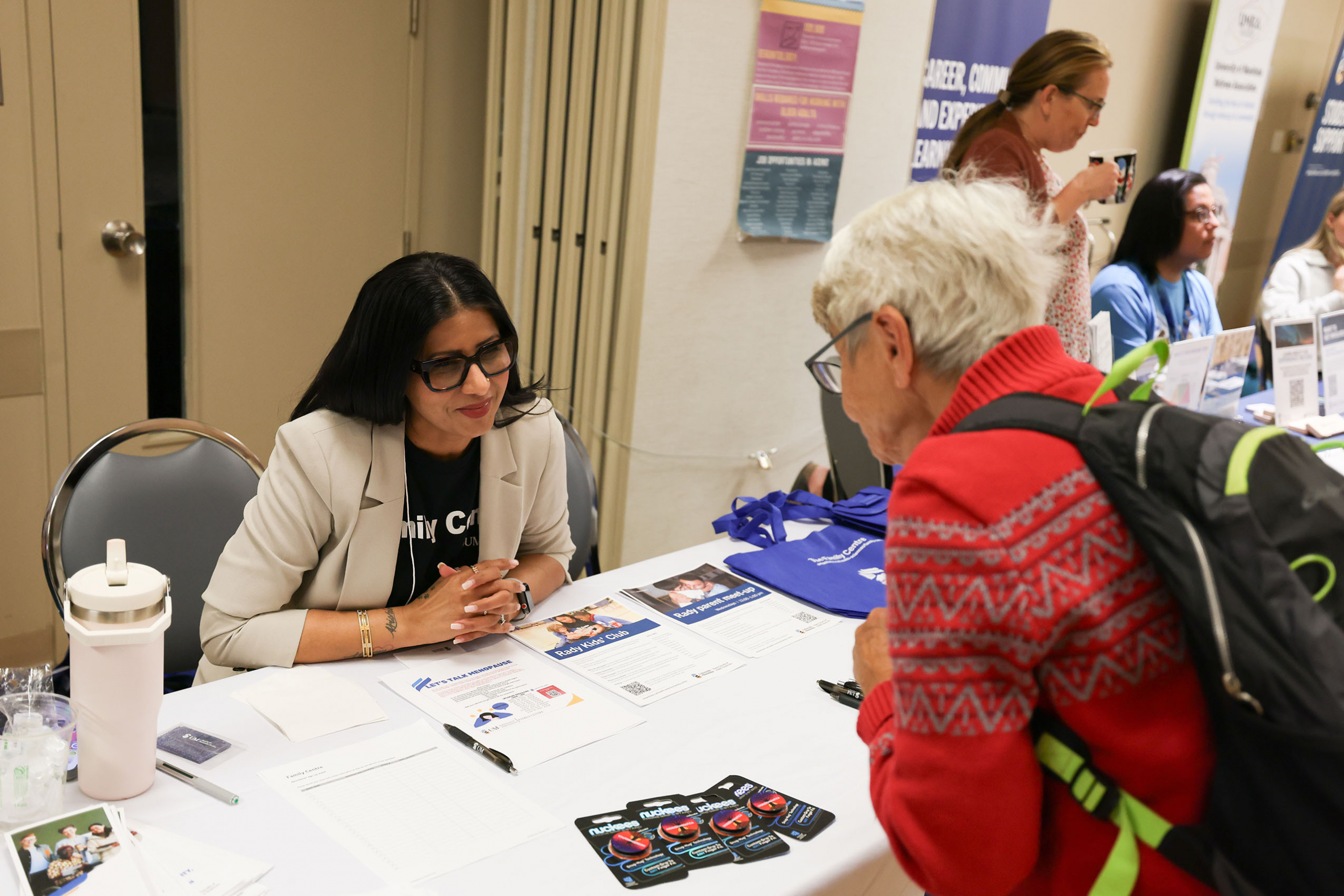 people talking at the Age-Friendly University Showcase
