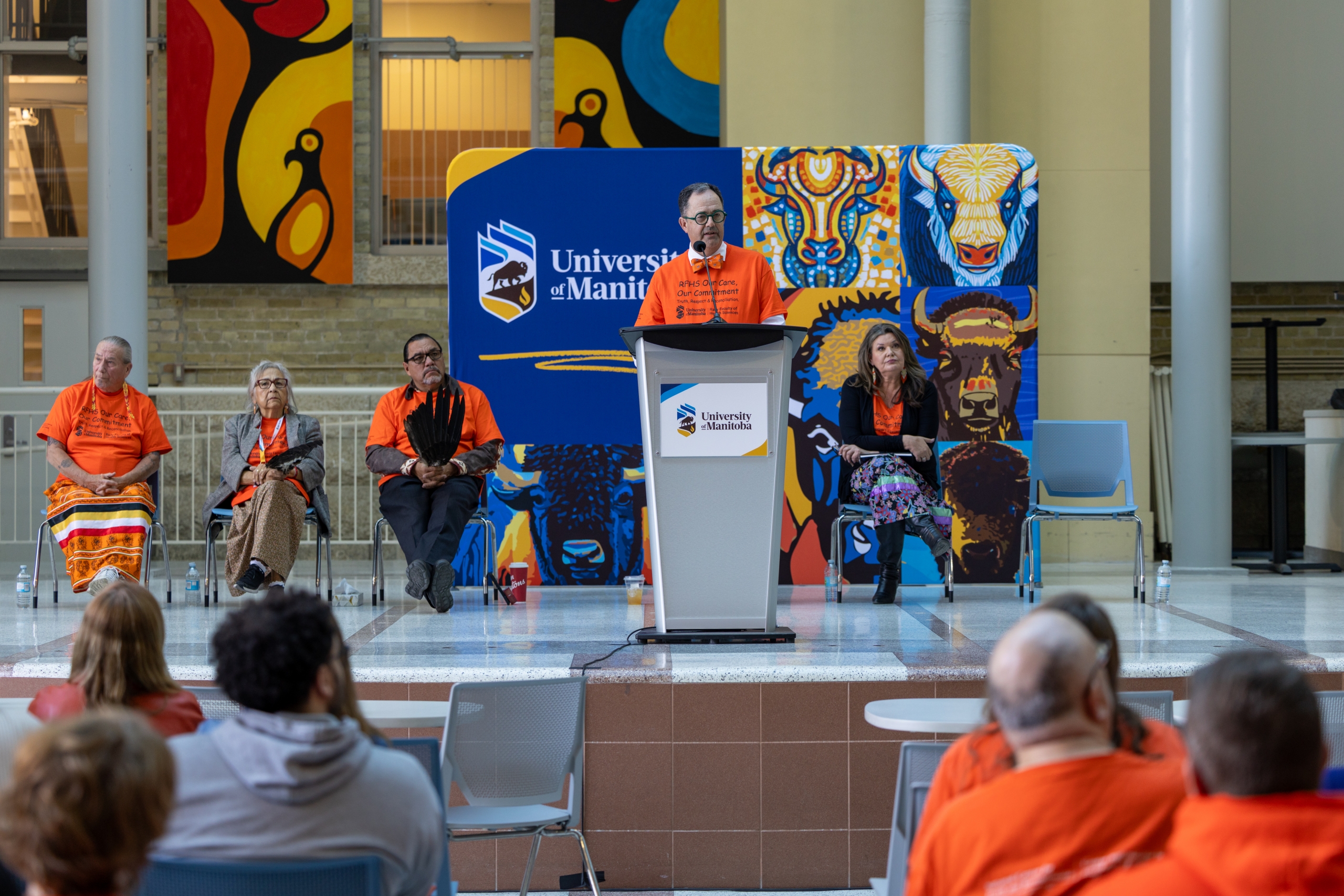 Dr. Peter Nickerson, dean of the Rady Faculty of Health Sciences, speaks onstage.