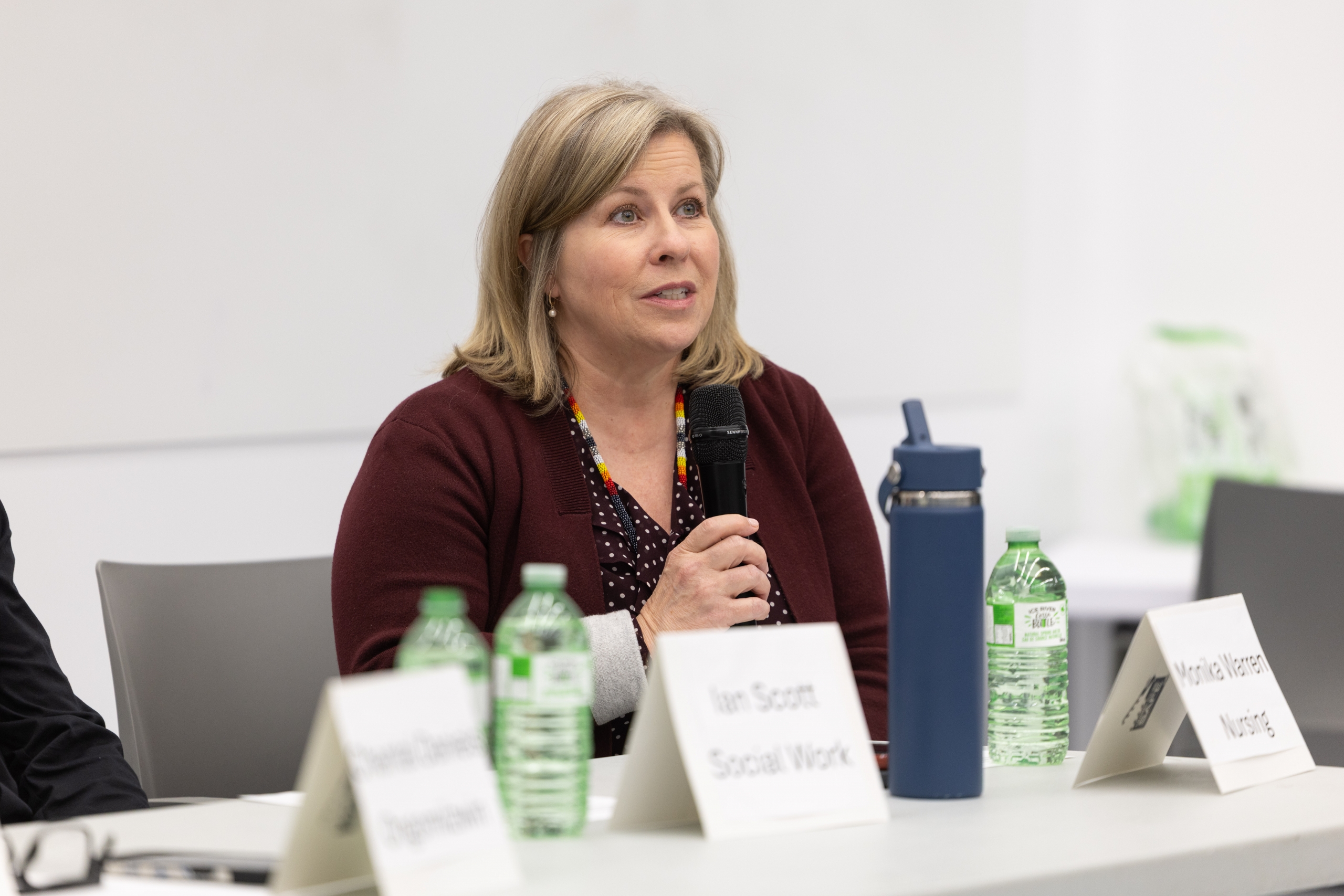 Monika Warren speaks during a panel discussion.