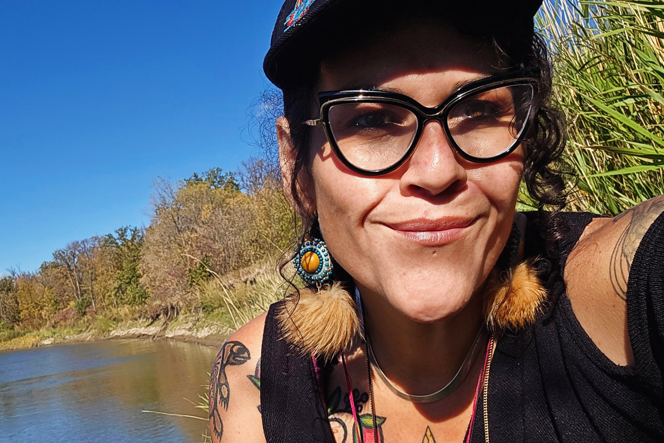 Aimee with the river behind them