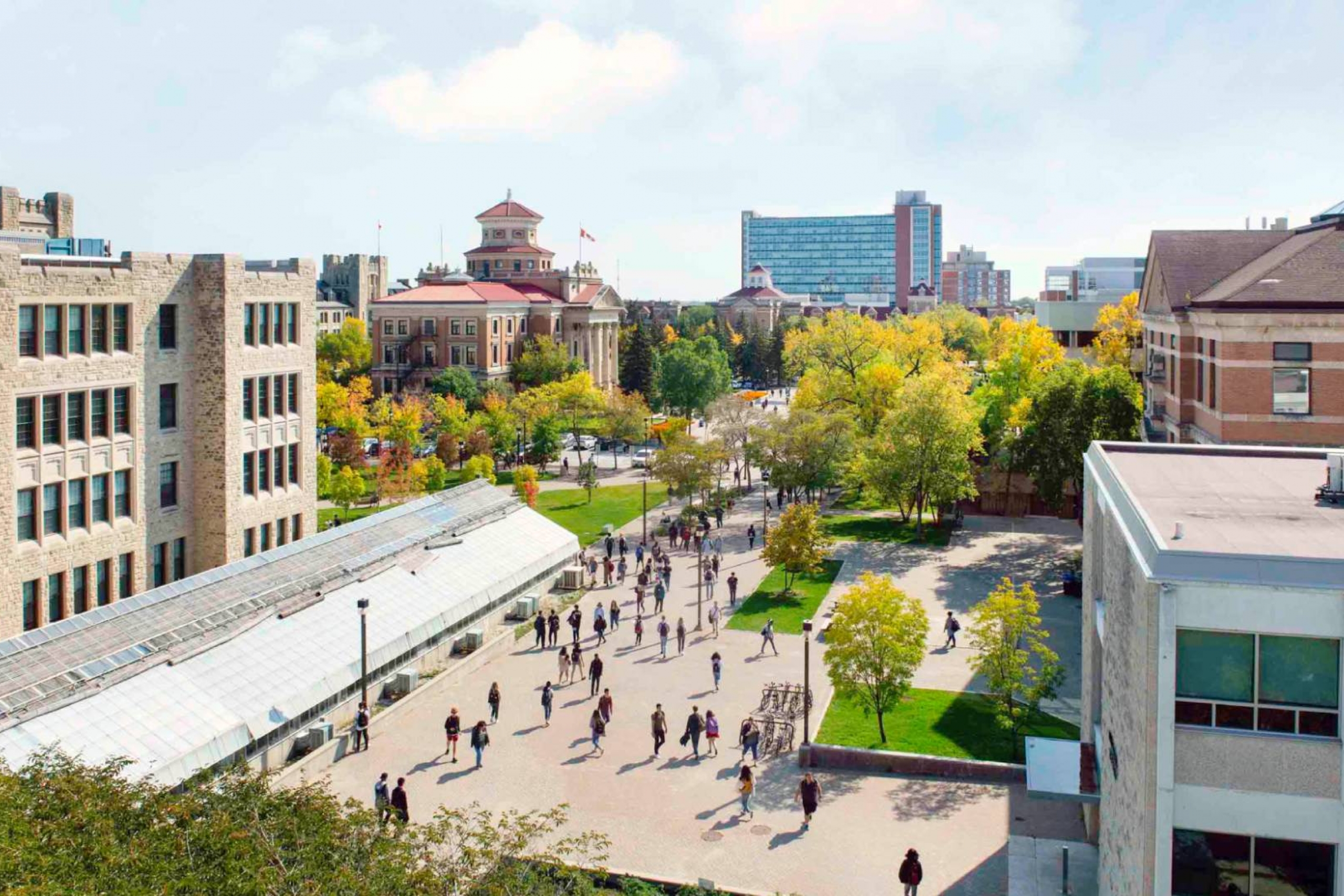 An aerial view of the Fort Garry campus featuring the Allen Building, the Administration Building and Pembina Hall in the distance.