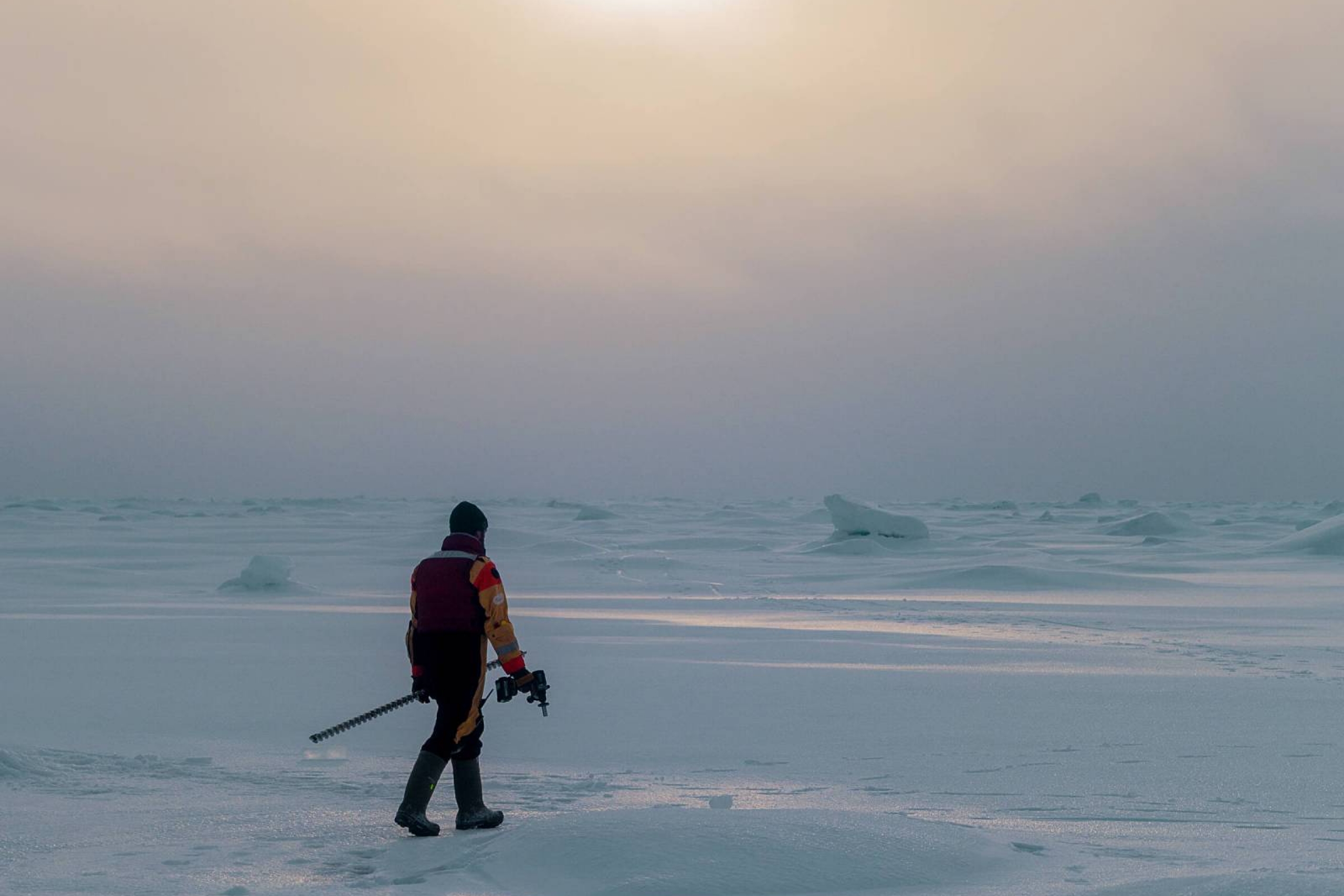 A man walks on the ice