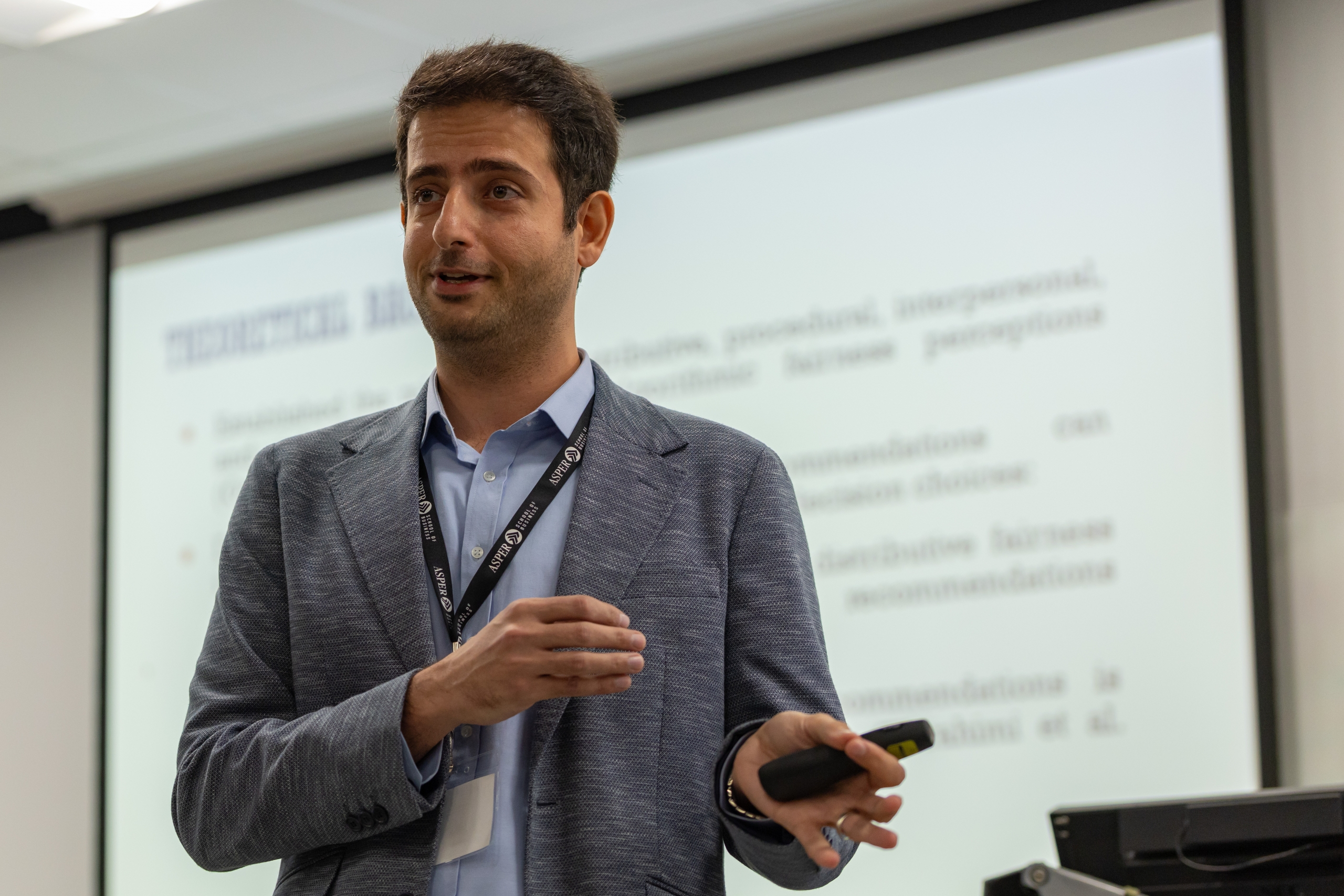 Asper researcher speaks at a conference