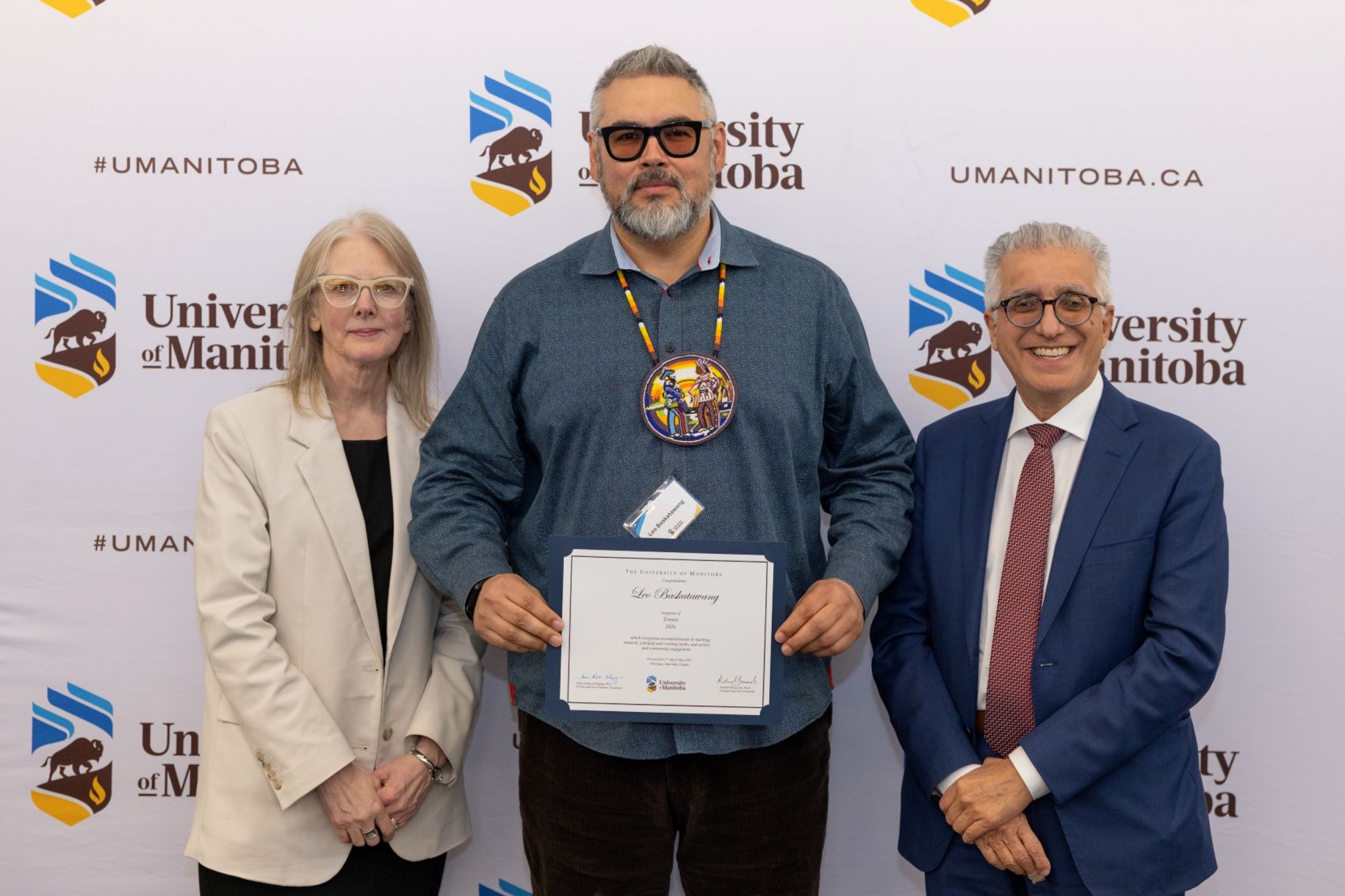 Leo Baskatawang with UM President and Provost
