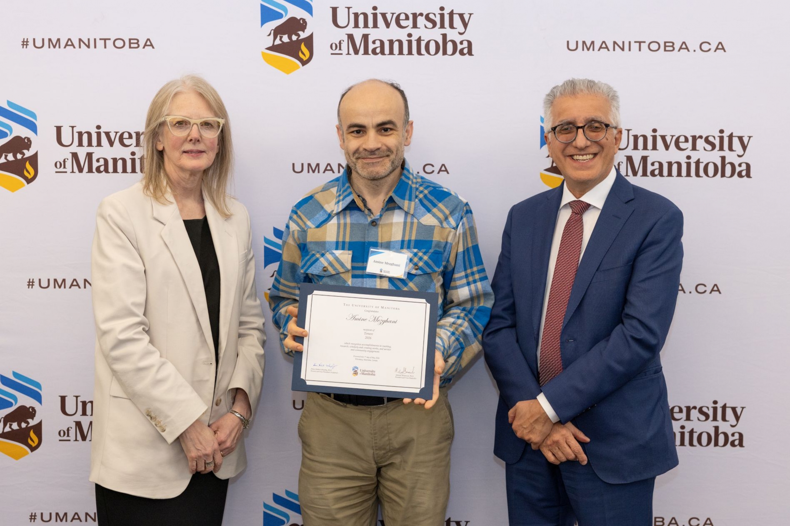 Amine Mezghani with UM President and Provost 