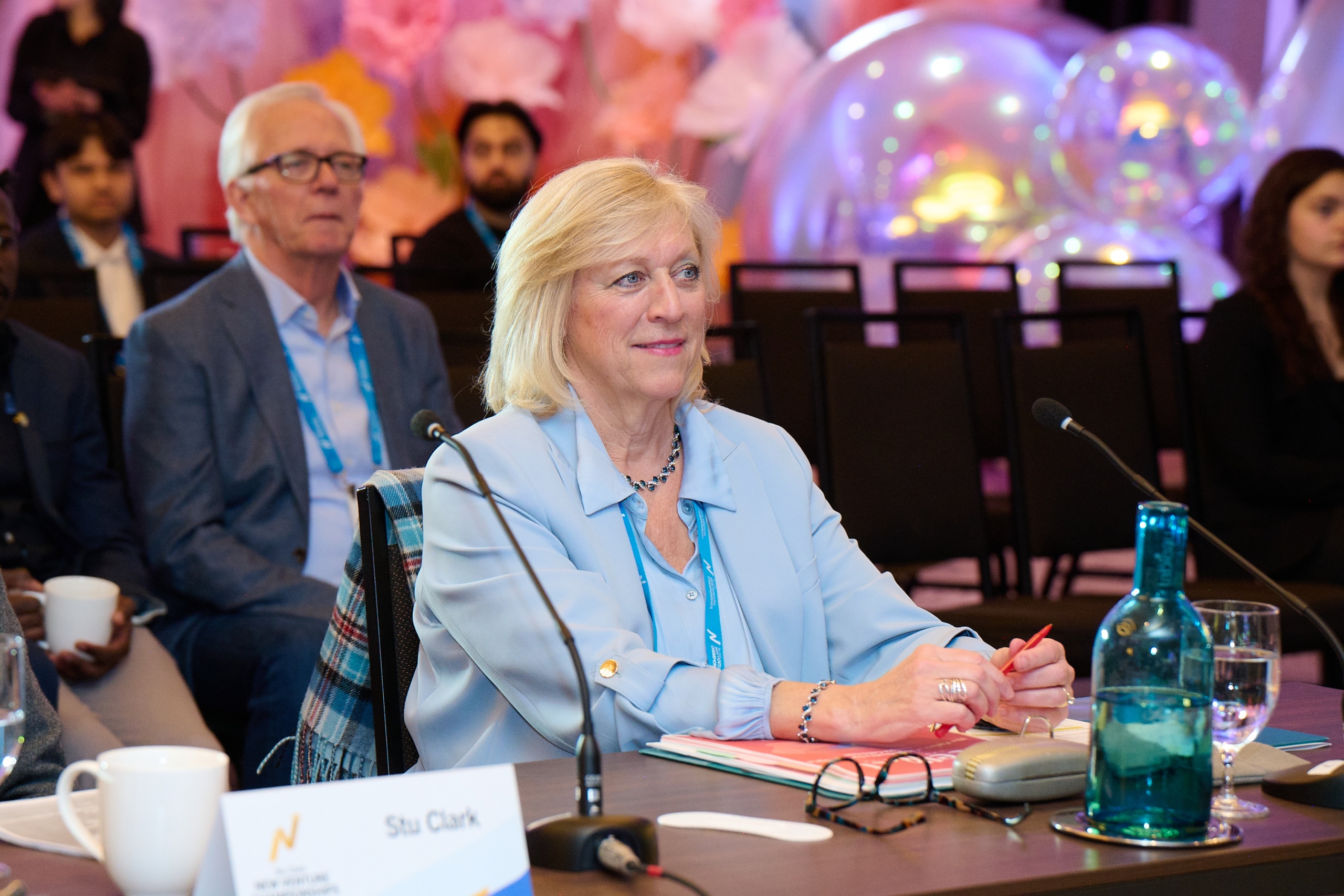 Fiona Webster Mourant sits at a judging table