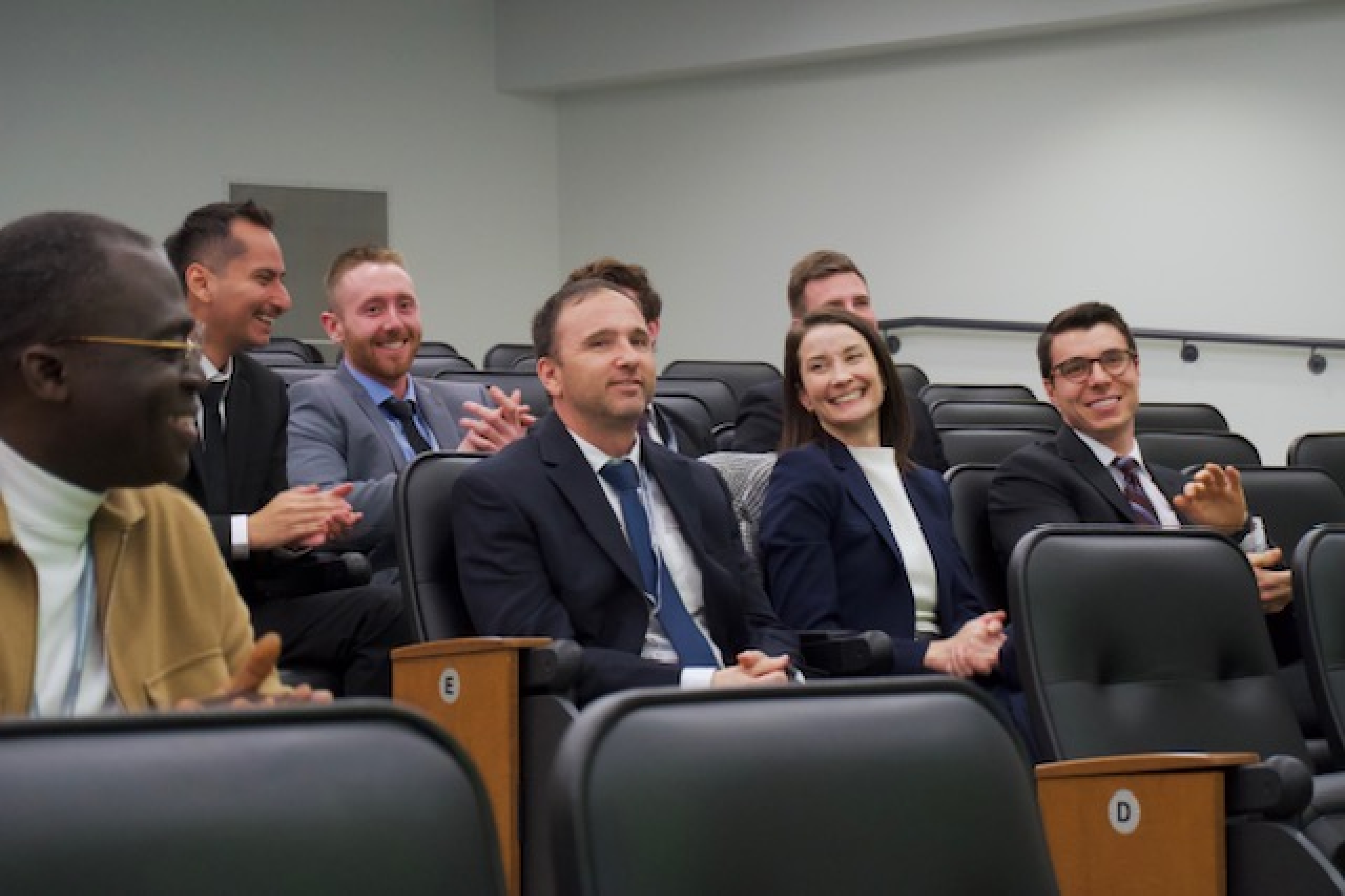 Loni Andres laughs along with some of her case competition teammates