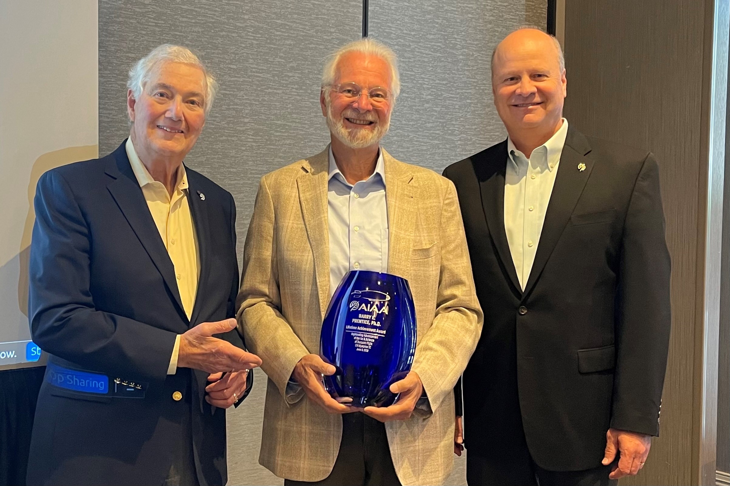 Barry prentice receives an award