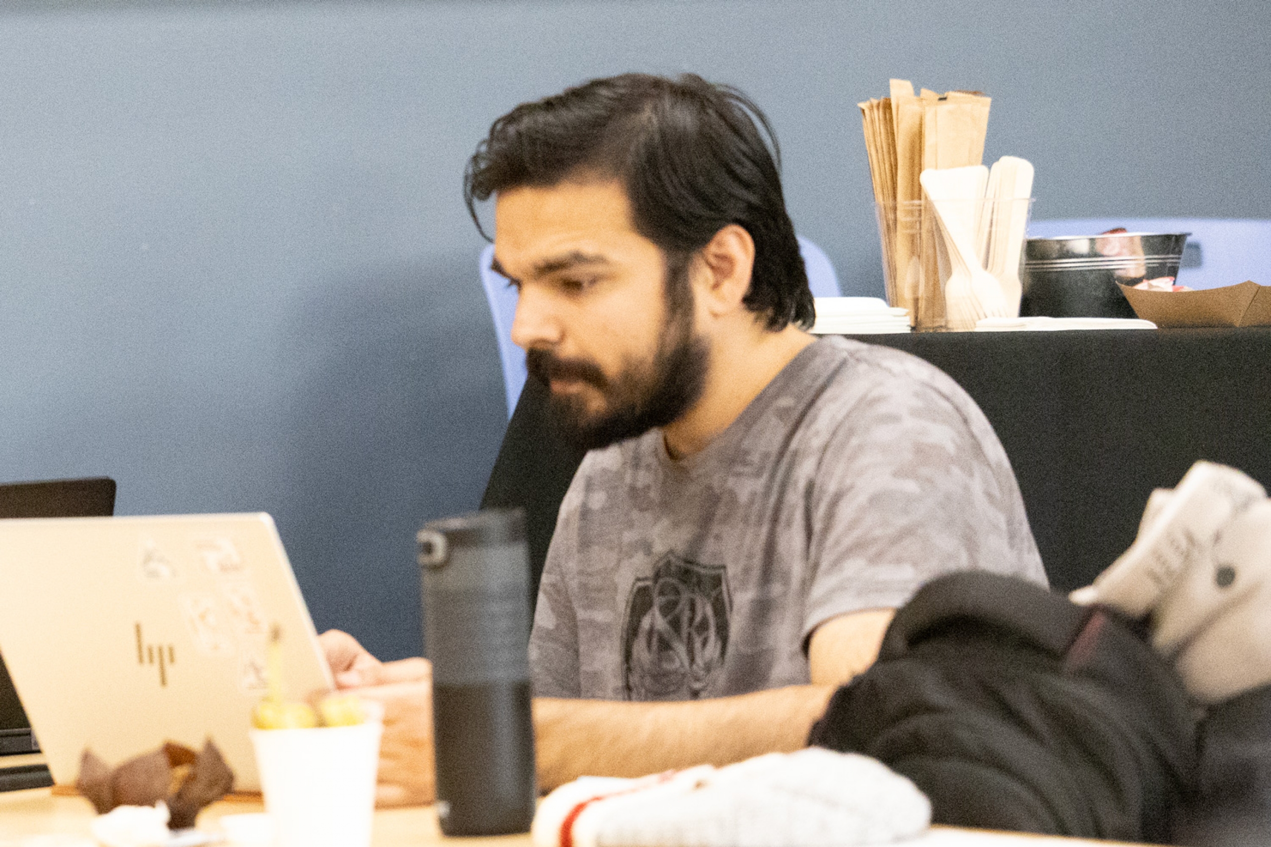 Student works on their thesis at the grad writing retreat