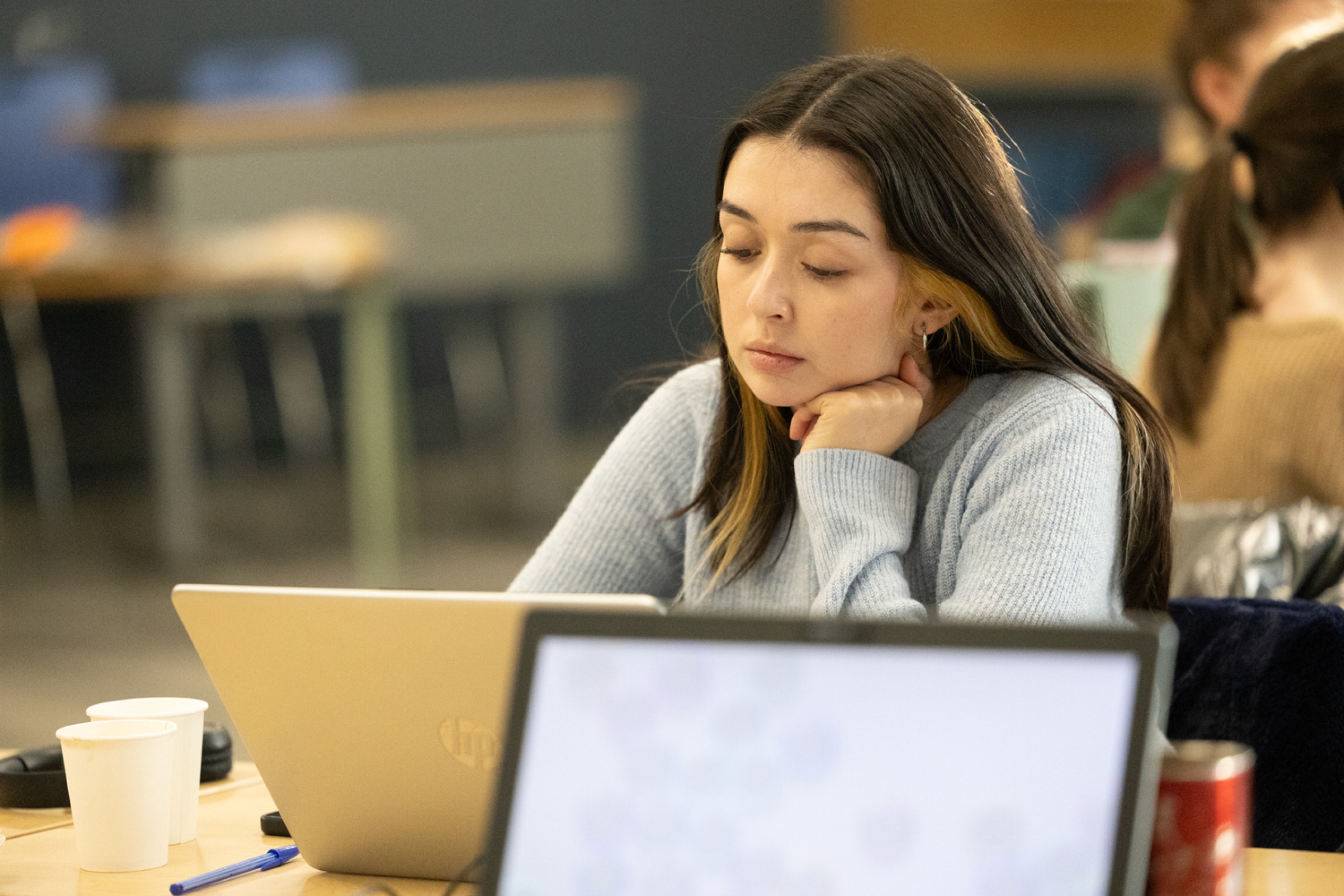Student works on their thesis at a writing retreat