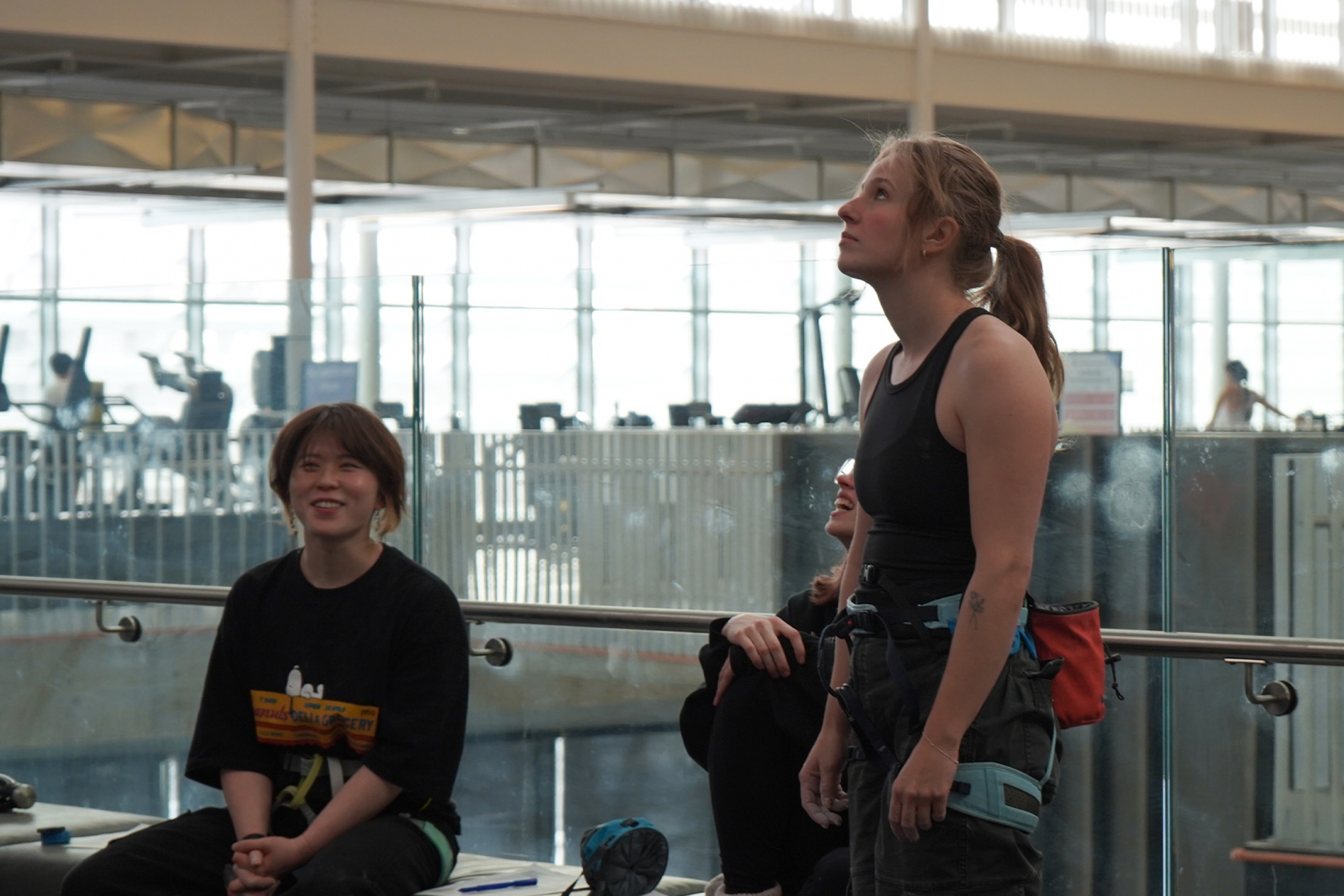 Climbing competitors looking up at the wall in the Active Living Centre